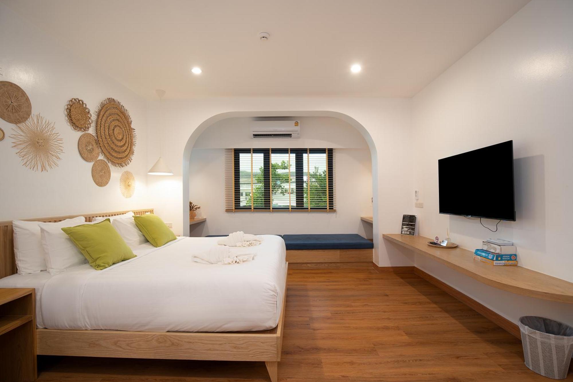 The Modeva Hotel Kanchanaburi by Rom bilde